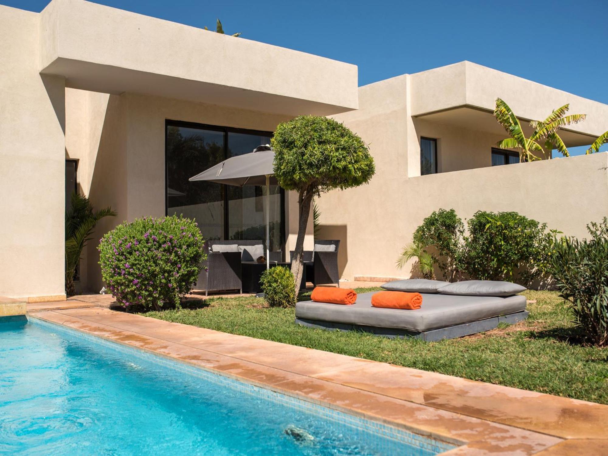 Suite Deluxe con Piscina Privata e Giardino